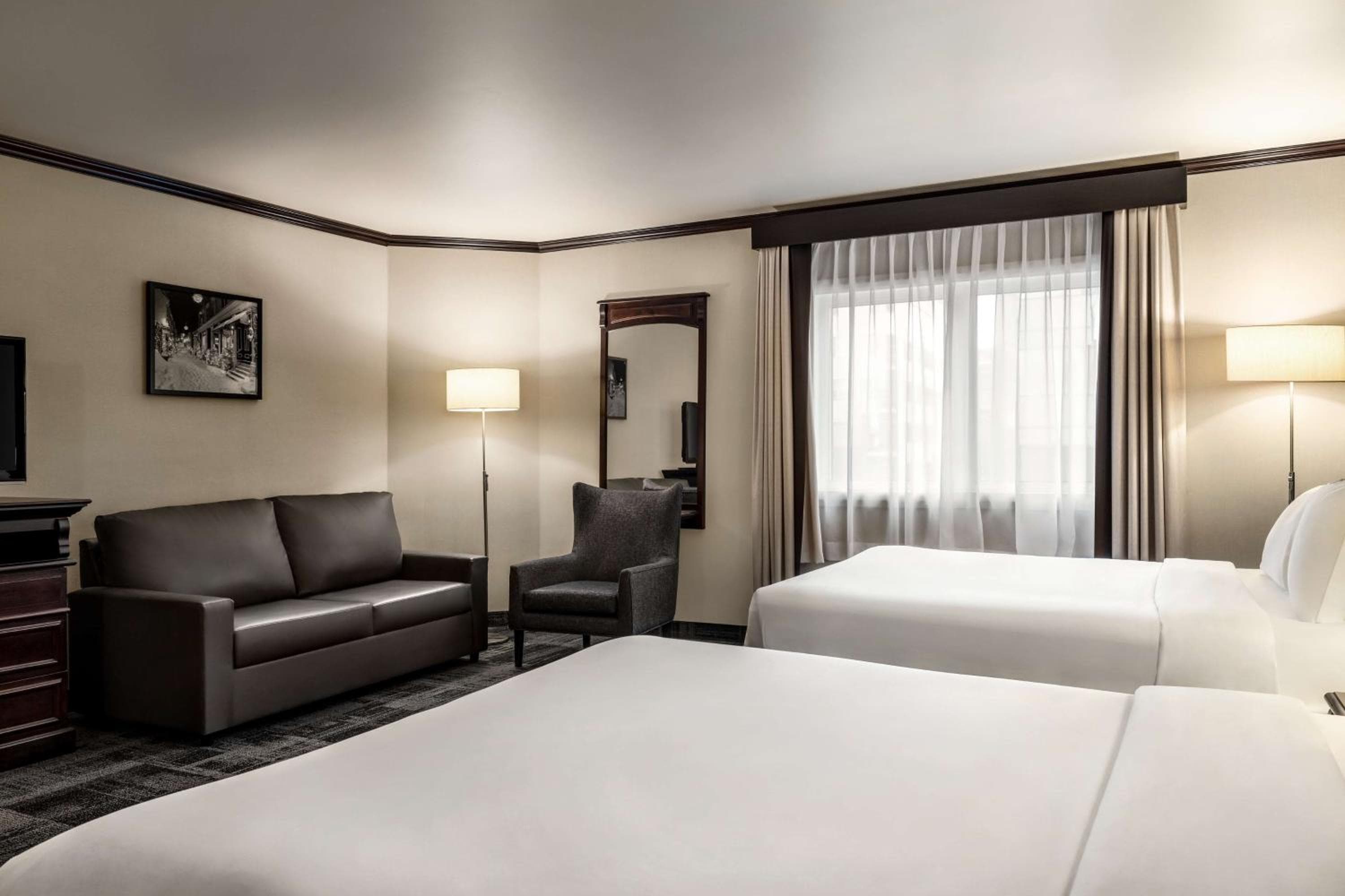 Business Queen Room with Two Queen Beds and Sofa Bed